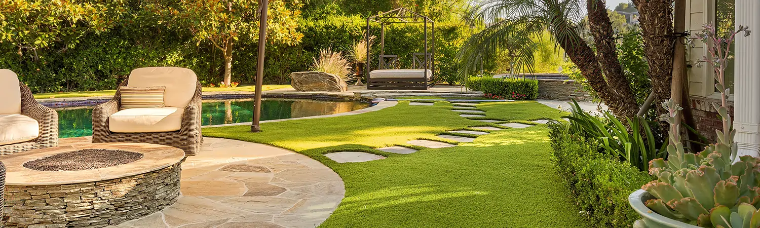 Backyard artificial grass pool area installed by SYNLawn