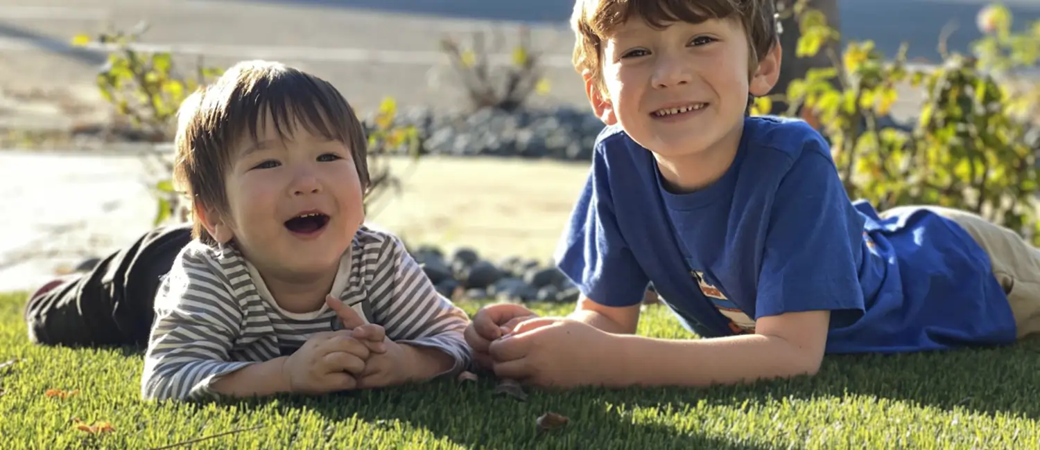 Kids playing on SYNLawn artificial grass